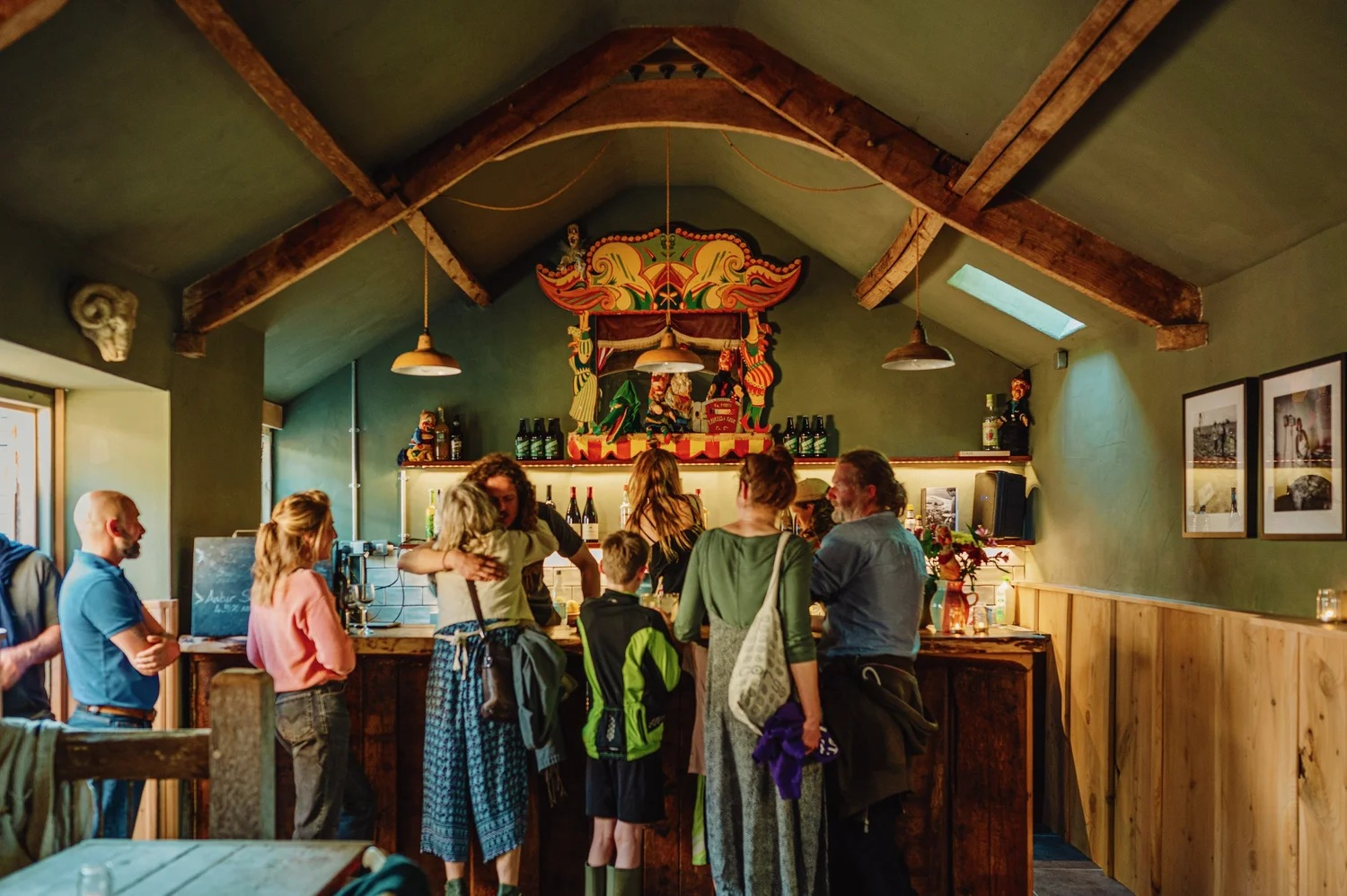 People gathered in Penpont’s cosy bar beneath exposed wooden beams.